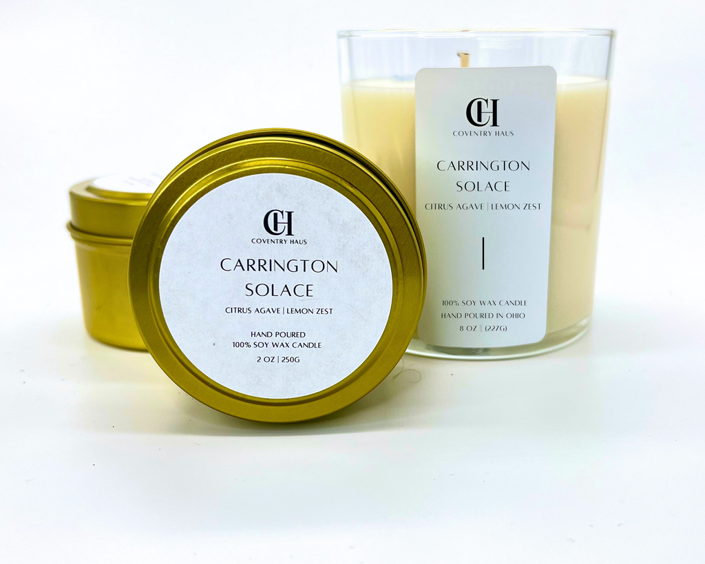 Carrington Solace candles in a tin and glass on a white background